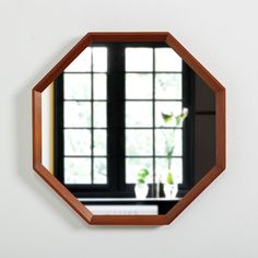 Teak Mirror, Octagonal Design, Danish mid-century Modern wall-mounted mirror from the 1960s Very easy to hang, see photo In generally good vintage condition, see photo SIZE: Hight: 45,0 cm / 17,7 in. Wide: 45,0 cm / 17,7 in. Depth: 3,0 cm / 1,2 in. PRICE: This listing is for one mirror, with delivery included to EU, GB, and North America. A small surcharge applies for shipping to other regions. We ship worldwide with tracking for all orders. SHIPPING: We offer combined shipping on multiple items Mid Century Modern Mirror, Mid Century Mirror, Teak Mirror, Danish Mid Century Modern, Mid Century Modern Walls, Wall Mounted Mirror, Photo Size, Home Decor Mirrors, Wooden Furniture