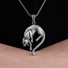 Elegant Black Panther Shaped Pendant in 925 Sterling Silver, Realistic Animal Jewelry, 3D Panther Pendant, Birthday and Anniversary Gift Made of 925 silver and handcrafted by hand, this ring is not only an accessory piece that complements your daily elegance, but also has details that will reflect your character and style. It is also a great gift to give to your loved ones on their special days. At SavisSilver, we always give importance to the satisfaction of our customers, we recommend you to r Black Panther Necklace, Animal Jewelry, Black Panther, Panther, Anniversary Gift, Silver Fashion, Solid Gold, Jewelry Necklace Pendant, Necklace Lengths