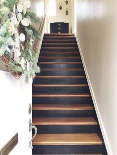 there is a black and white stair case on the stairs