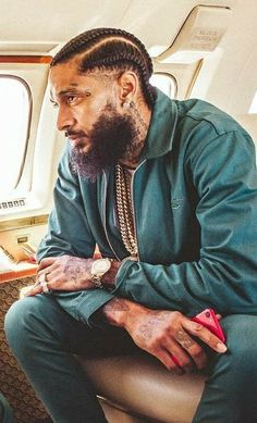 a man sitting on top of an airplane seat