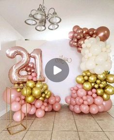 balloons are arranged in the shape of letters and numbers for an entrance to a party