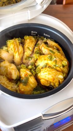 some food is in a pan on top of a stove burner and it's ready to be cooked