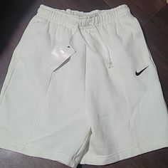 Nike Sportswear Essential Fleece High Rise Shorts Size Xs New W/Tags Smoke Free/ Pet Free Home White Nike Sweats Sportswear, Nike White Sportswear Sweats, Casual Fleece Bottoms For Gym, Sporty White Athletic Shorts With Drawstring, White Activewear With Comfort Waistband For Workout, Comfortable White Athletic Shorts For Loungewear, Casual White Joggers With Drawstring, Nike Cotton Joggers For Workout, Nike White Relaxed Fit Sweatpants