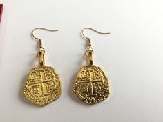 These gold colored replica pirate coins earrings are fun! They would be perfect for Halloween with a pirate costume, & for St. Patrick's Day! Handmade in Minnesota in 2019. Pirate Earrings, Pirate Coins, Coin Earrings, Pirate Costume, Saint Patrick, St Patricks, St Patricks Day, St Patrick, Favorite Jewelry