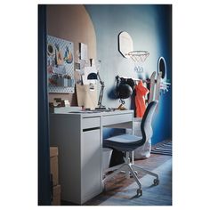 a desk with a chair and a basketball hoop on the wall