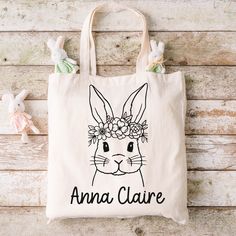 a tote bag with an image of a bunny wearing a flower crown on it