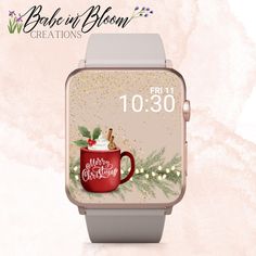 a smart watch with a merry christmas message on it's screen and an image of a cup of hot chocolate