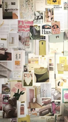 a wall covered in lots of different types of papers and pictures with flowers on them