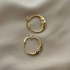 Gold Crescent Hoop Earrings With Ear Wire, Celestial Gold Plated Hoop Earrings As Gift, Moon Charm Huggie Earrings, Gold Crescent Hoop Earrings With Moon Phase, Minimalist Crescent Hoop Earrings With Moon Charm, Gold Celestial Huggie Earrings For Everyday, Gold Celestial Huggie Earrings As Gift, Gold Celestial Small Hoop Huggie Earrings, Celestial Huggie Hoop Earrings For Everyday