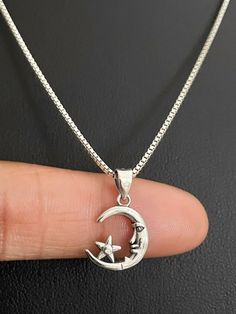 "Minimalist a d Dainty Sterling Silver Moon & Star Necklace, Celestial Necklace NECKLACE FEATURES: Metal: All components are made from solid .925 Sterling Silver Model is wearing 16\" in length solid .925 Sterling Silver Chain Length available: 16\", 18\" or 20\" Measurements For Moon & Star Pendant: Height: 18.7mm Width: 12.3mm Thickness: 2.1mm Please send me a convo if you have any questions before placing your order. Please also view my policy before purchasing. Please visit my storef Star Necklace Aesthetic, Moon Star Pendant, Moon Star Necklace, Silver Model, Necklace Moon, Celestial Necklace, Jewelry Accessories Ideas, Funky Jewelry, Necklace Necklace