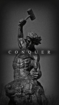 a black and white photo of a statue with the words conquer in front of it