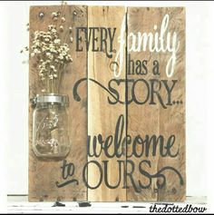 there is a mason jar with flowers in it and the words every family has a stop welcome to ourss