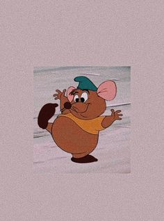 an animated mouse with a hat and scarf on it's head, standing in the sand