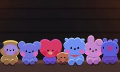 a group of teddy bears sitting next to each other