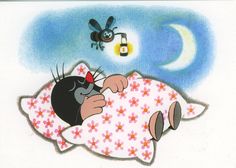 an image of a cat sleeping in bed with a bug flying over it's head