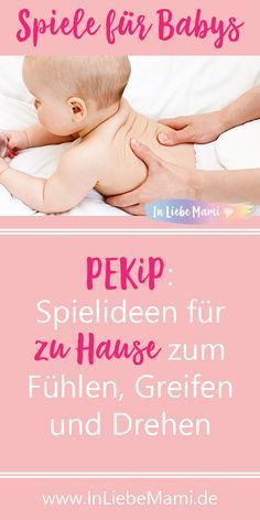 a baby laying on top of a bed next to a pink sign with the words pekp spelled in german