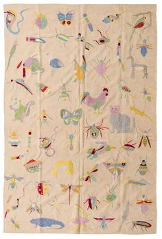 an image of a blanket with animals and birds on it in various colors, shapes and sizes