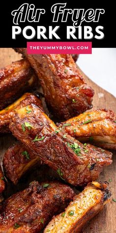 air fryer pork ribs on a cutting board with text overlay that says air fryer pork ribs