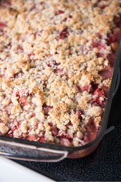 a casserole dish with crumbled topping on top