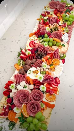 a long platter filled with lots of different types of food