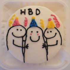 a birthday cake with three people on it