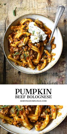 pumpkin beef bolognzoe with fettuccine and parmesan cheese