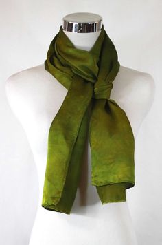 "Hand dyed 12mm satin silk, 14\"x72\" Light green abstract satin scarf, this elegant scarf is one of kind and ready to ship. These are a medium weight silk with a great drape and flow. Silky with an extremely smooth shiny top surface, this is what many people think of when they think \"silk\". Nice when you want something more luxurious and less sheer. The lustrous satin surface is wonderful for painting! They have hand rolled hems with 100% silk thread Product information: Designer - Mary Jane Formal Green Silk Scarves, Formal Green Silk Scarf, Green Silk Scarves For Formal Occasions, Green Silk Scarf For Formal Occasions, Elegant Green Satin Silk Scarf, Elegant Green Scarf For Formal Occasions, Artistic Hand Dyed Green Silk Scarf, Artistic Hand-dyed Green Scarves, Elegant Hand-dyed Silk Scarf Gift