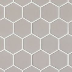 a white and gray hexagonal tile pattern that looks like hexagon tiles