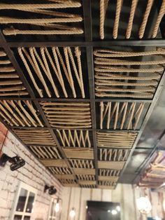 the ceiling is covered with wicker sticks