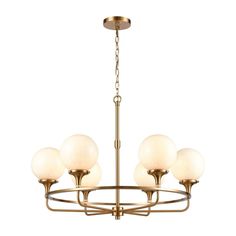 a brass chandelier with five white glass balls hanging from the bottom and four gold chains