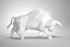 an origami sculpture of a bull on a white background with low light lighting