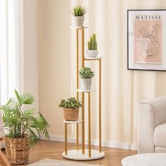 three tiered plant stand in the corner of a living room