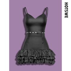 a black leather dress with ruffles on the bottom and straps at the waist