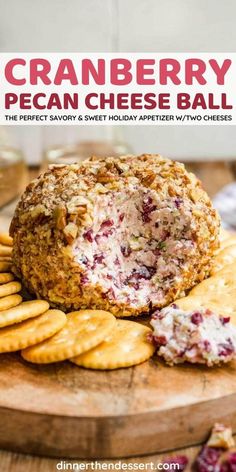 cranberry pecan cheese ball on a cutting board with crackers