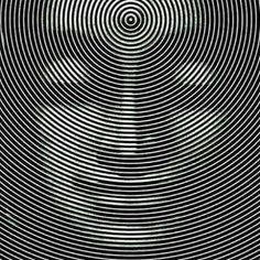 an abstract black and white background with spirals in the shape of circles, which appear to be distorted