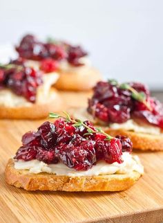 cranberry spread on top of bread on a cutting board