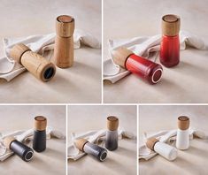 four different types of wooden pepper shakers on a white cloth with black and red caps