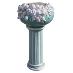 a green vase with white flowers and leaves on it's pedestal, against a white background