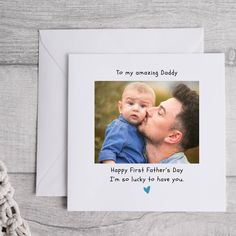 a father's day card with the words to my amazing daddy and his baby