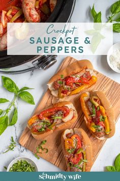 sausages and peppers are served on buns with sauce in the background, along with other ingredients