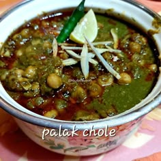 a close up of a bowl of food on a table