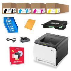 the printer is next to several different types of inks and other things that are on display