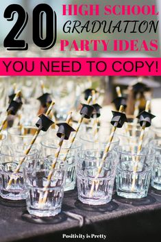 graduation party decorations with black and gold straws in glasses on top of a table