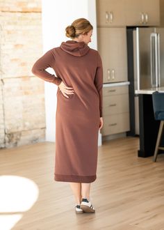 The Rae Hoodie Sweatshirt Dress is back in two new colors! This is a maxi version of our fan-favorite Marti Sweatshirt Midi Dress! Designed based on your feedback to be longer and lighter weight for everyday wear! This dress will be great for snuggling up on the couch, heading out during cooler weather, or paired with leggings for work! It is super soft and fuzzy on the inside with quality fabric outside and a large kangaroo pocket. There are wide ribbed hems on the bottom and cuffs with thumb h Leggings For Work, Plus Jumpsuit, Hoodie Sweatshirt Dress, Dress Gift, Long Sleeve Maxi, Tops Fall, Cooler Weather, Plus Dresses, Sweatshirt Dress