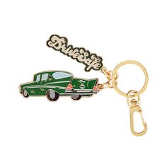 a green car keychain with the word's logo on it