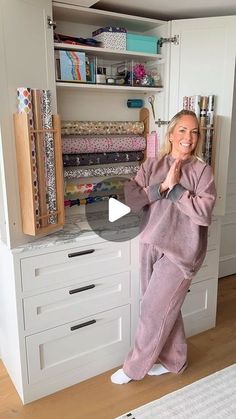 a woman standing in front of a closet