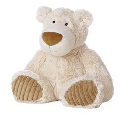 a large white teddy bear sitting on top of a white floor next to a wall