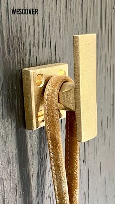 a close up of a door handle on a wooden door with text overlay that reads, wessover