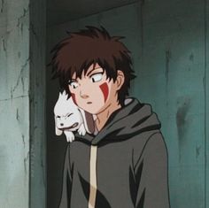 an anime character holding a white cat in his arms and looking at the camera man's face