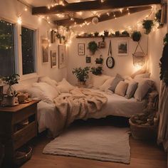 a bed room with a neatly made bed and lots of lights